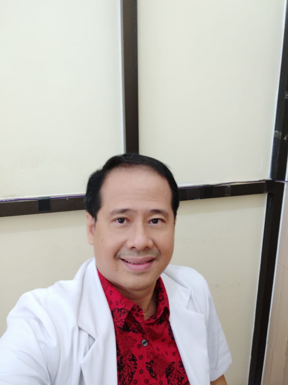 dr. Erwin Adams Pangkahila